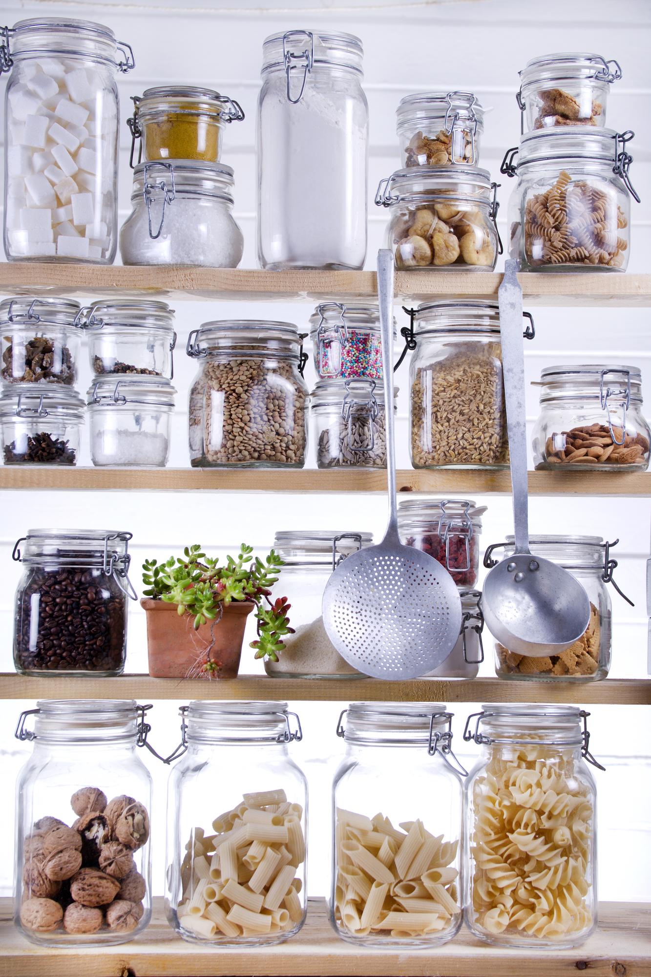 Workshop pantry shelves with labeled jars